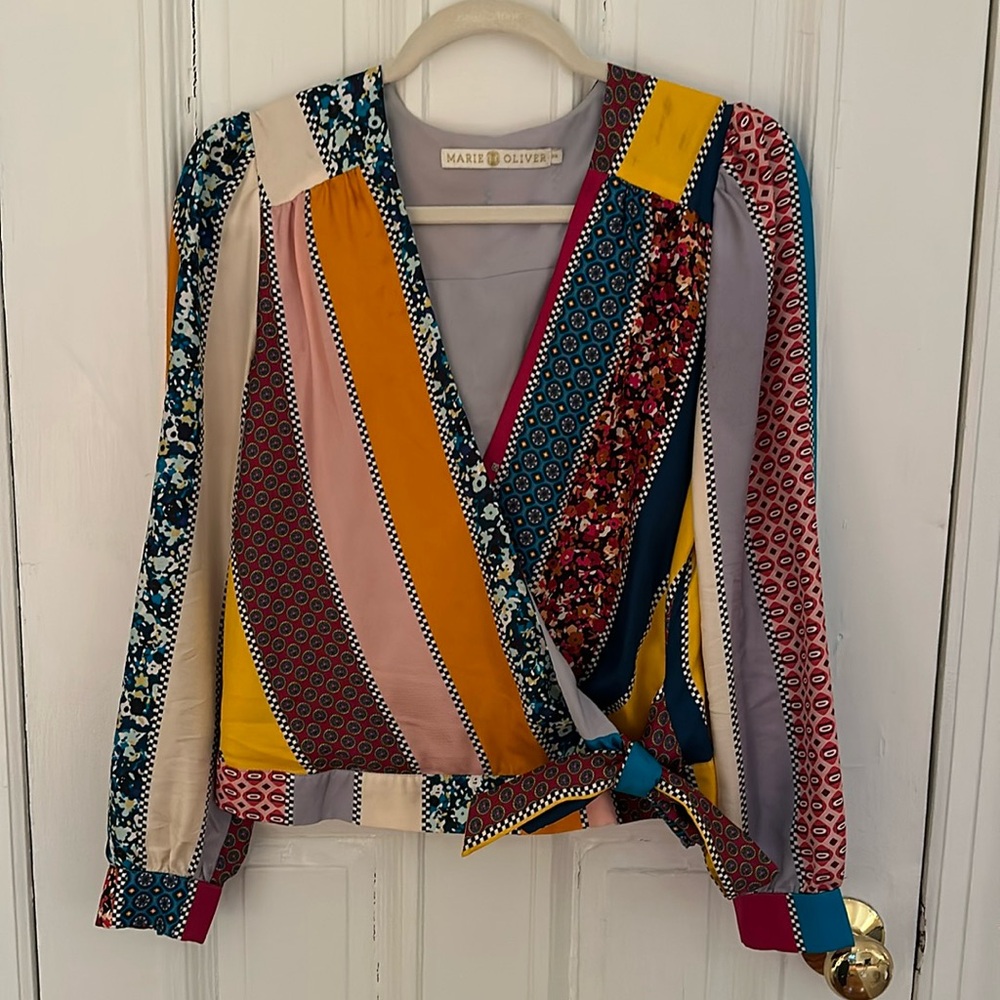 Multi-colored silk Marie Oliver blouse with contrast pattern design.